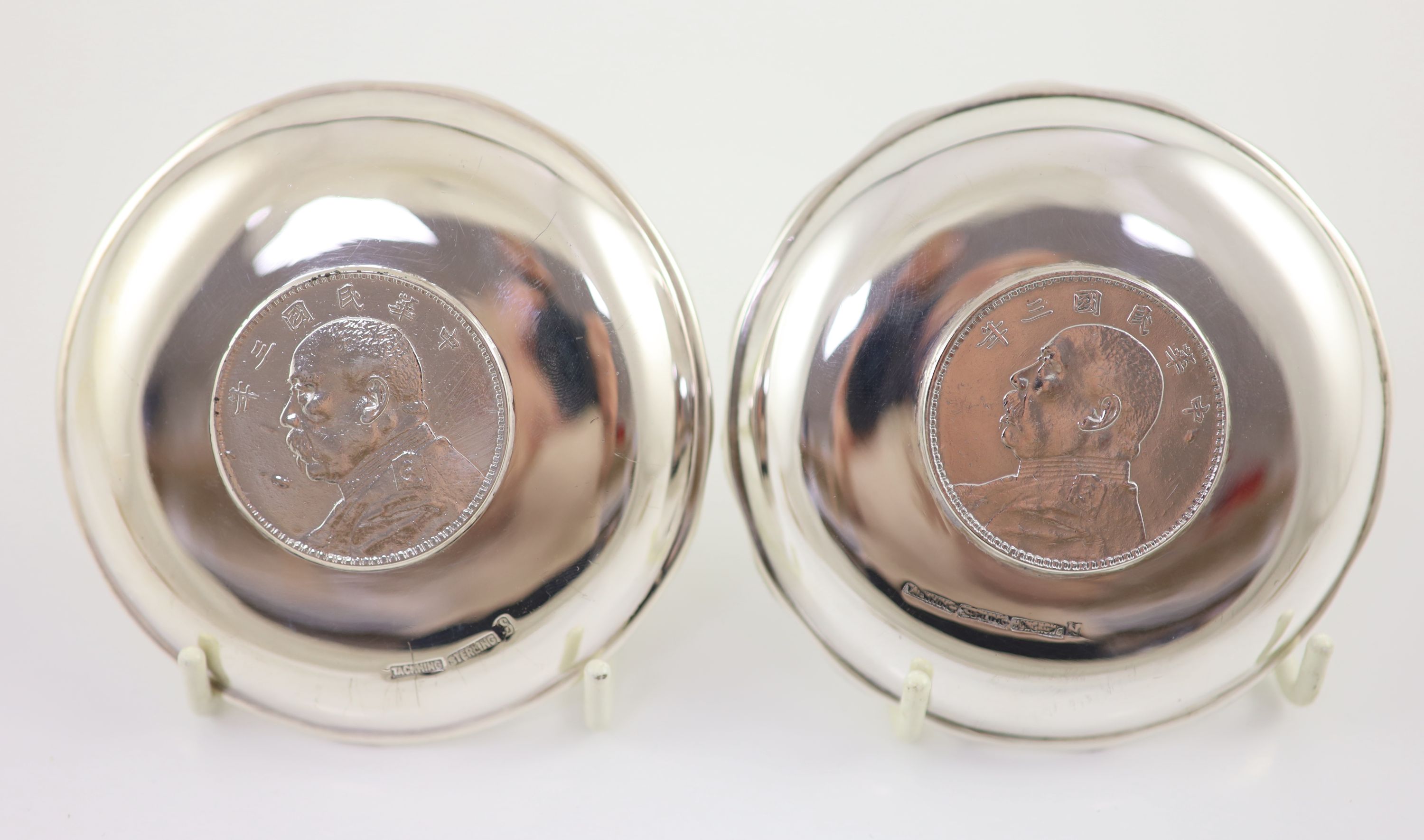 Ten early 20th century Chinese Export small Sterling silver coin inset dishes with shaped 'bamboo' edges, by Tach Hing, Hong Kong,
